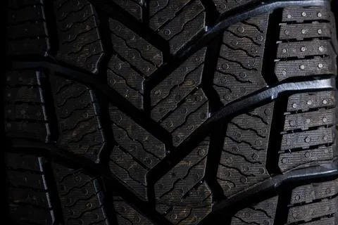 Studless snow tire close up macro shot landscape Stock Photos