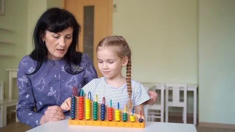 Study addition and subtraction with kids. Stock Footage 126909810