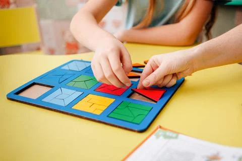 Study of color and shape. Matching game. Montessori methodology tool for Stock Photos