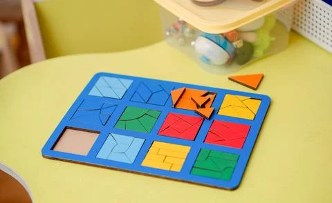 Study of color and shape. Matching game. Montessori methodology tool for Stock Photos