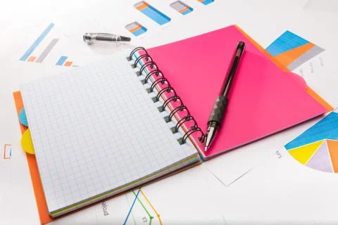 Study concept with school notebook, papers and a pen Stock Photos