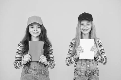 Study group can help solidify and clarify material. Kids girls with books study Stock Photos