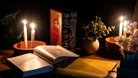 Study Islamic books in candle Stock Photos