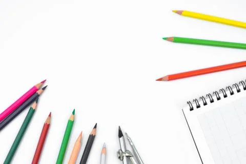 Study materials containing different color pencil,a pencil compass and a diar Stock Photos