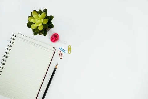Study materials containing a notebook,a black pencil,some different colored p Foto stock
