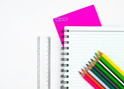 Study materials containing a row of different color pencil,a plastic scale ,a Stock Photos