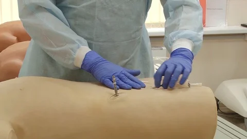 Study on a medical simulator Stock Footage 103188566