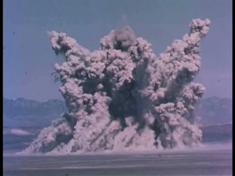 Study of a mushroom cloud from an atomic blast Stock Footage 75099371