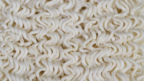 Study of noodle texture and packaging aesthetics in studio. Highresolution photo Stock Footage 331754935