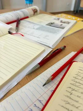 Study Notebooks Textbook And Red Pens Foto stock