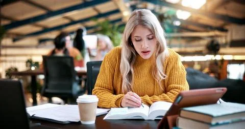 Study, notes and college student with books, exam knowledge or research for.. Stock Photos