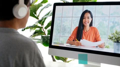 Study online class, Student man listen to lecture while online learning with Stock Photos