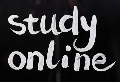 'Study online' text on glass with white paint on black back 写真素材