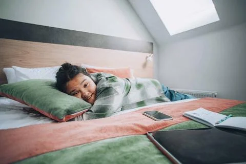 Study overload, featuring a student who has collapsed into sleep Stock Photos