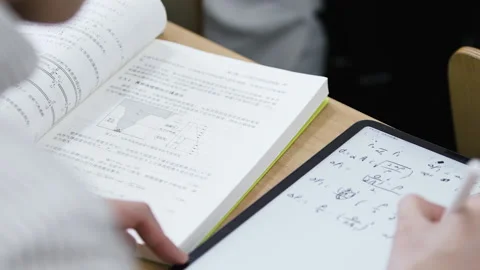 Study with pad，People who write, take notes, electronic tablet, modern Stock Footage 233680642