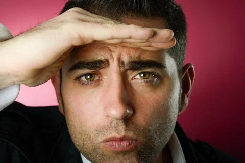 Study portrait of an attractive middle-aged man looking in the distance Stock Photos