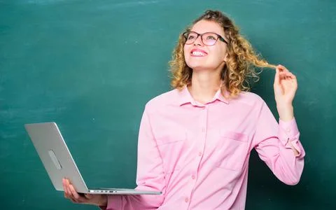 Study programming languages. Girl surfing internet. School of digital Foto stock