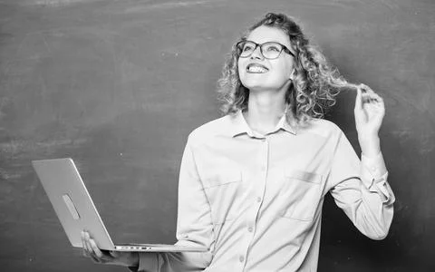 Study programming languages. Girl surfing internet. School of digital Foto stock