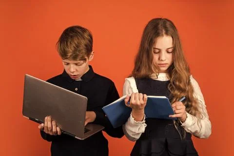 Study programming. Student with laptop computer. Child using pc. Life online Stock Photos