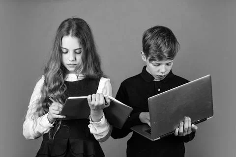 Study programming. Student with laptop computer. Child using pc. Life online Stock Photos