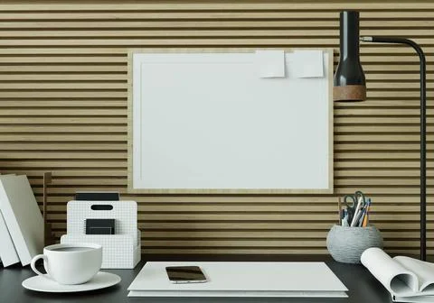 A study room with a book placed on a black table with a picture frame on th.. Stock Photos