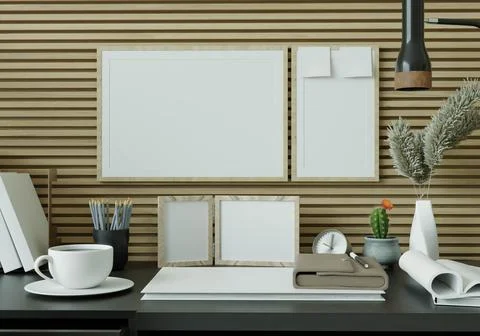 A study room with a book placed on a black table with a picture frame on th.. Stock Photos