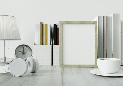 A study room with a book placed on a white table with a picture frame on th.. Stock Photos
