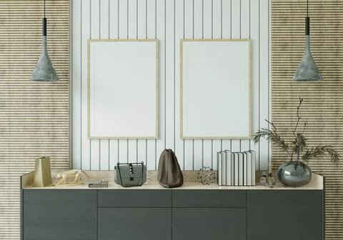 The study room is decorated with a table, picture frames, lamps and small p.. Stock Photos