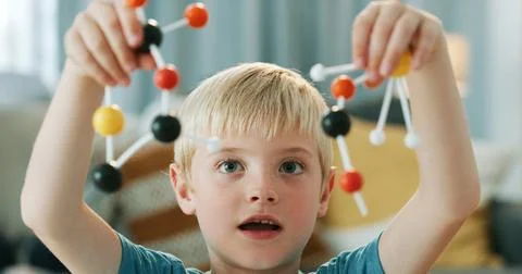 Study, science and child with atom model for project, education or assignme.. Stock Photos