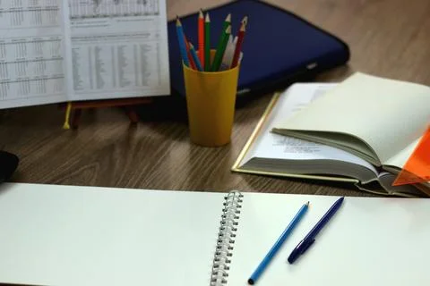Study table with textbooks and pencils Stock Photos