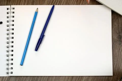 Study table with textbooks and pencils Stock Photos