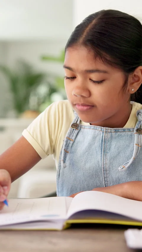 Study, thinking and child with writing homework for math assessment, equation Stock Footage 335310557