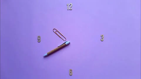 Study time. Stop motion. Time on clock from 9 to 12 o'clock. Stock Footage 236493696