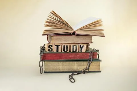 Study will set you free, still life concept with stacked  books and broken .. Stock Photos