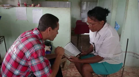Studying the Bible in Cuba Video stock 41815860