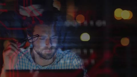 Studying code laptop generating binary overlays window while man rubbing eyes Stock Footage 318476237