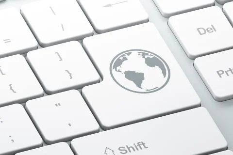 Studying concept: Globe on computer keyboard background Illustrazione stock