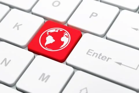 Studying concept: Globe on computer keyboard background Illustrazione stock
