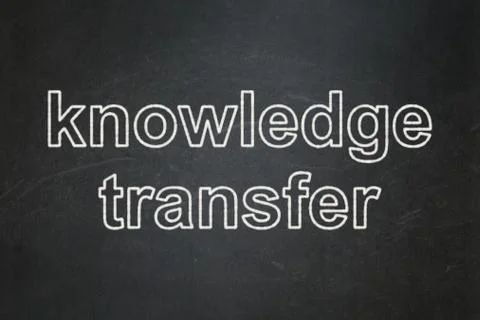 Studying concept: Knowledge Transfer on chalkboard background Illustrazione stock
