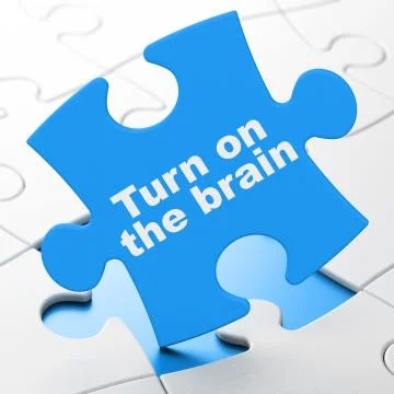 Studying concept: Turn On The Brain on puzzle background Illustrazione stock