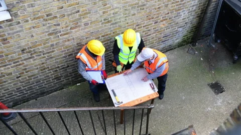 Studying the construction plan. Stock Footage 171626544