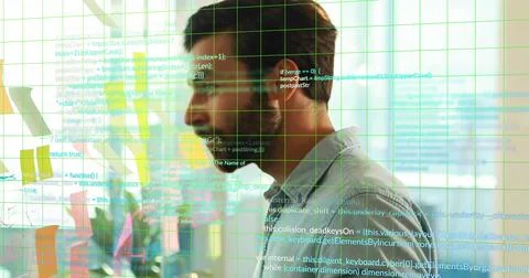 Studying engineer scanning code on glass at office, wearing collared shirt, 스톡 사진