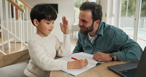 Studying, high five and father with child in home, teaching problem solving or Stock Footage 318209645