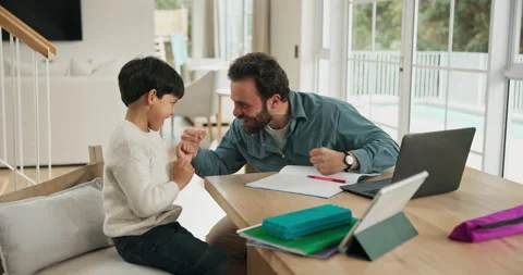 Studying, high five and father with son in family home, teaching problem solving Stock Footage 318794069