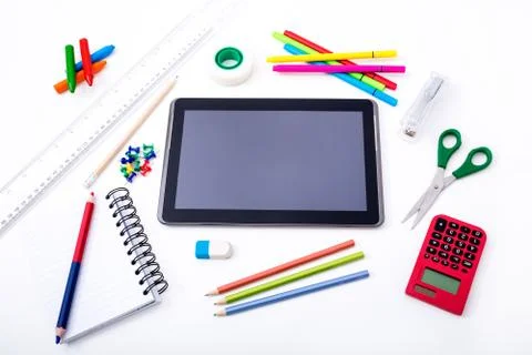 Studying at home doing homework using the tablet. Stock Photos