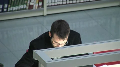 Studying at the library Stock Footage 21085708
