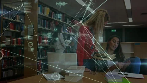 Studying in library, students with network connections and data processing Stock Footage 303615550