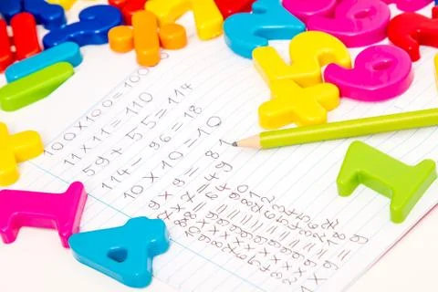 Studying maths and doing calculations as homework. Foto stock