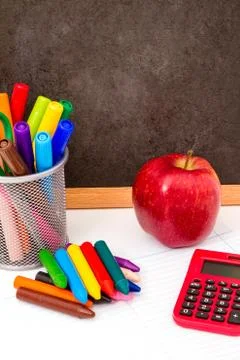 Studying maths and doing calculations at school. Stock Photos