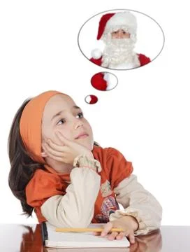 Studying thinking about santa Stock Photos